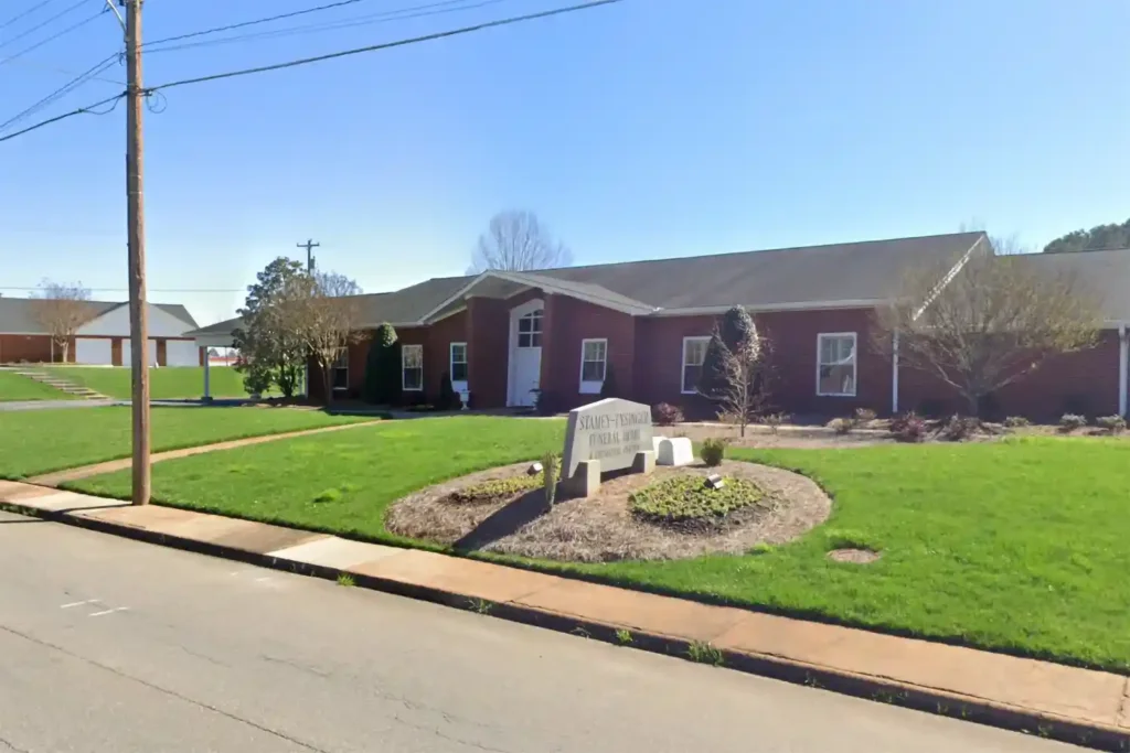 Exterior view of Stamey Funeral Home Fallston NC, showcasing its welcoming entrance and serene surroundings.