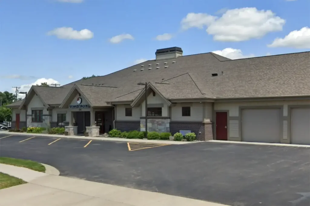 Exterior view of Vertin Munson Wahpeton Funeral home in Wahpeton, ND, showcasing its welcoming entrance.